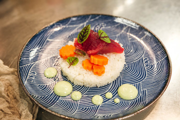 Plating ahi tuna and carrot dish
