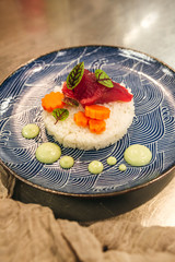 Plating ahi tuna and carrot dish