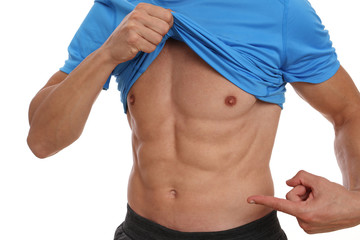Man showing his strong abdominal muscles. Bodybuilding, sport, fitness ,workout, active lifestyle...