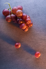 dates, on a gray background, with light spots, top view