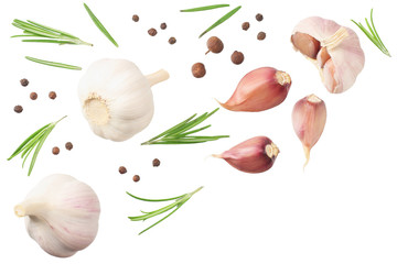 garlic with rosemary, peppercorns and allspice isolated on white background. top view