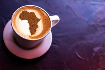 Cup of cappuccino with a picture of Africa