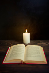 Candle and book