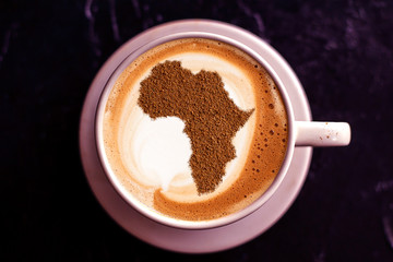 Cup of cappuccino with a picture of Africa