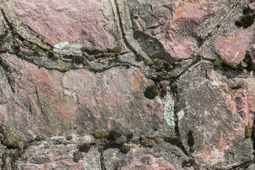 Detail of stone wall closeup as stone background