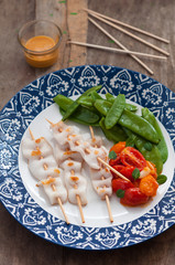 Grilled Squid Skewers with Sauteed Tomatoes and Snow Peas