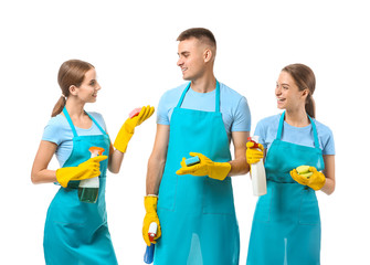 Team of janitors on white background