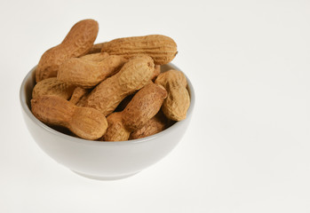 peanuts in a bowl isolated