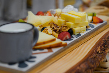 cheese aperitif on a rustic table