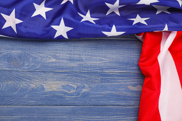 Fototapeta na wymiar USA flag on wooden background. Memorial Day celebration