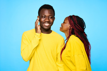 young man and woman listening to music