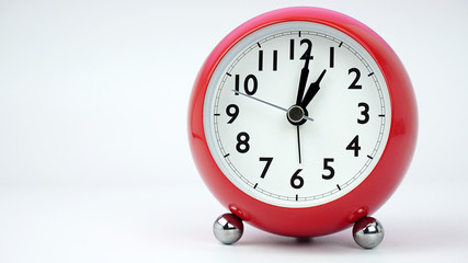 Red Alarm clock beginning of time 01.01 am or pm, on white background, Copy space for your text, Time concept. .