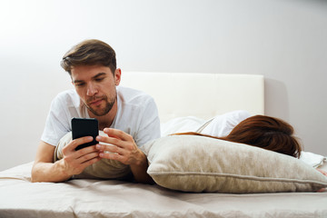 Fototapeta premium young man watching tv on sofa