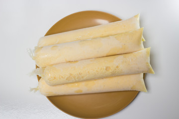 Brazilian sweet frozen homemade - Freezer pops gourmet, ice scream in the bag. Known in Brazil as: Sacolé, dindin, chupchup or geladinho