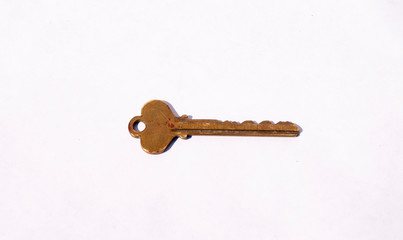 old key on white background