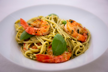 King prawns and pesto sauce with spaghetti