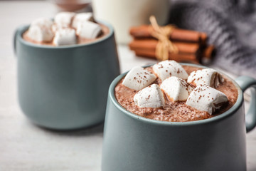 Cup of delicious hot cocoa with marshmallows, closeup