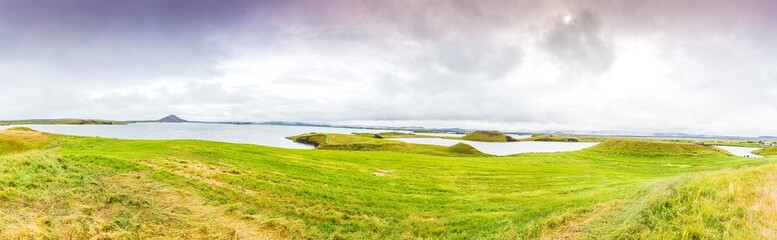 Panoramic picture from Hverfjall volcano to Mývatn lake area in Northern Iceland in summer