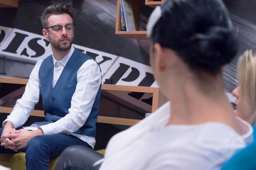 Young students listening the lecture with interest on university