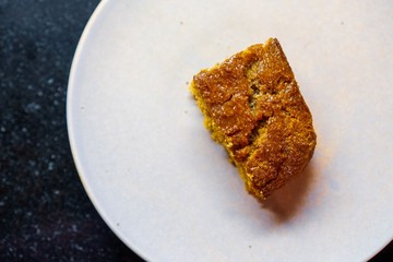Slice of cornbread on a plate