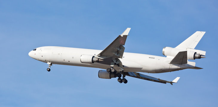 Chicago, USA - November 21, 2017: A cargo MD-11 aircraft on final approach to O'Hare International Airport.  