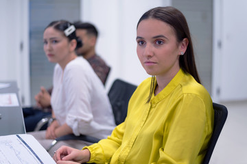 Young students listening the lecture with interest on university