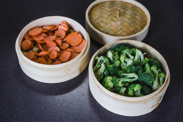 veggies in bamboo steamer for asian cuisine