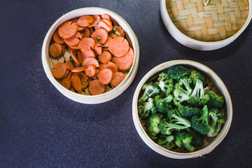 veggies in bamboo steamer for asian cuisine