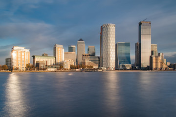 Fototapeta na wymiar Skyline of Canary Wharf District With the Sun Reflecting in Buildings, London, UK