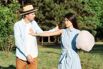 man and woman in park