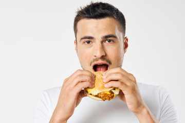 man eating pizza