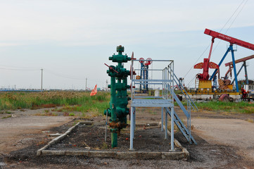 Fototapeta na wymiar The pipe and valve oil fields