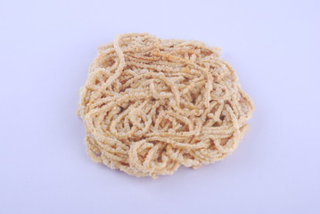 Mee siput is a famous local snack eaten with sambal or chili sauce.