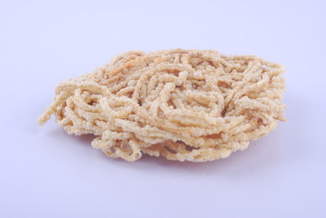 Mee siput is a famous local snack eaten with sambal or chili sauce.
