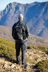 Fototapeta na wymiar Caucasian tourist man posing in the Spanish mountain Montseny