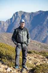 Fototapeta na wymiar Caucasian tourist man posing in the Spanish mountain Montseny