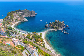 Naklejka na ściany i meble Aerial view of Isola Bella island and beach in Taormina, Sicily, Italy. Ionian seacoast. Isola Bella (Sicilian: Isula Bedda) also known as The Pearl of the Ionian Sea