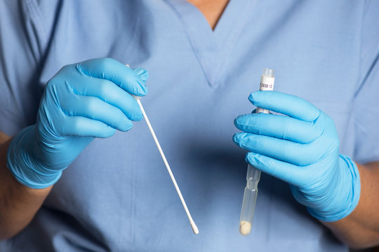 Nurse Holding Culture Swab