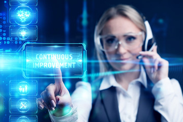 Business, Technology, Internet and network concept. Marketing content. Businessman presses a button Continuous improvement on the virtual screen tablet future.