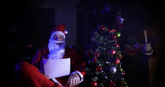 Santa Claus reading christmas letter