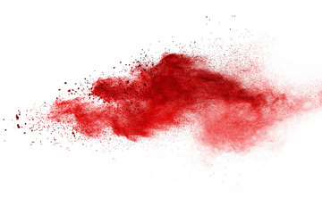 Red powder explosion on white background. Colored cloud. Colorful dust explode. Paint Holi.
