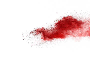 Red powder explosion on white background. Colored cloud. Colorful dust explode. Paint Holi.