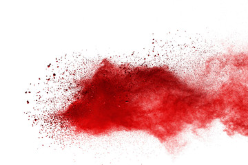 Red powder explosion on white background. Colored cloud. Colorful dust explode. Paint Holi.