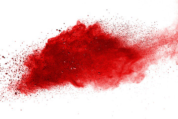 Red powder explosion on white background. Colored cloud. Colorful dust explode. Paint Holi.