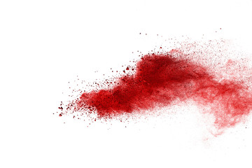 Red powder explosion on white background. Colored cloud. Colorful dust explode. Paint Holi.