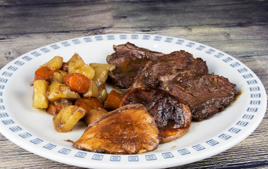 HOOK OF STEAK WITH POTATOES AND PORCINI MUSHROOMS
