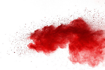 Red powder explosion on white background. Colored cloud. Colorful dust explode. Paint Holi.