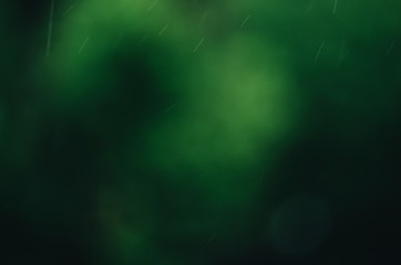 Abstract drops on the green background