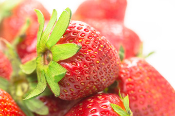 Some strawberries on white background