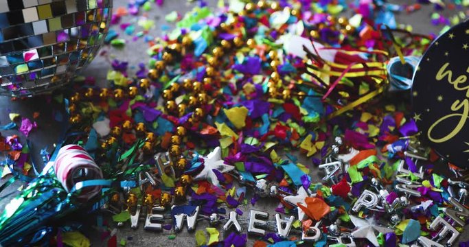 Video Slide Across New Year's Party With Falling Confetti